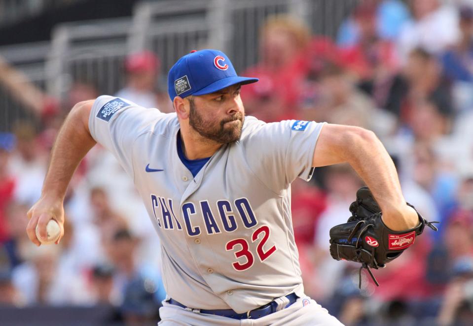 Chicago Cubs relief pitcher Michael Fulmer (32) throws against the St. Louis Cardinals  in London series game two on June 25, 2023, at London Stadium.