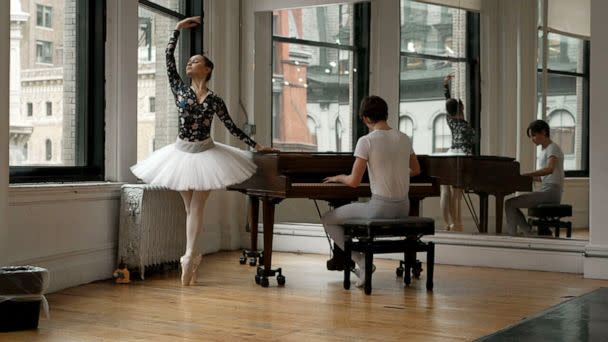 PHOTO: Yeva Hrytsak, 18, is shown practicing ballet moves with fellow dancer Nikita Malaki at the piano. (ABC News)