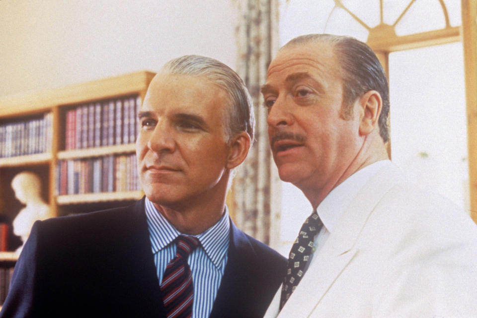 Actors Michael Caine, on the right, and Steve Martin on the left in a scene from the movie Dirty Rotten Scoundrels; they play two con-men, the elegant and sophisticated Lawrence Jamieson and the younger, reckless Freddy Benson, that contend for a hunting territory. Antibes (France), 1988. (Photo by Mondadori via Getty Images)