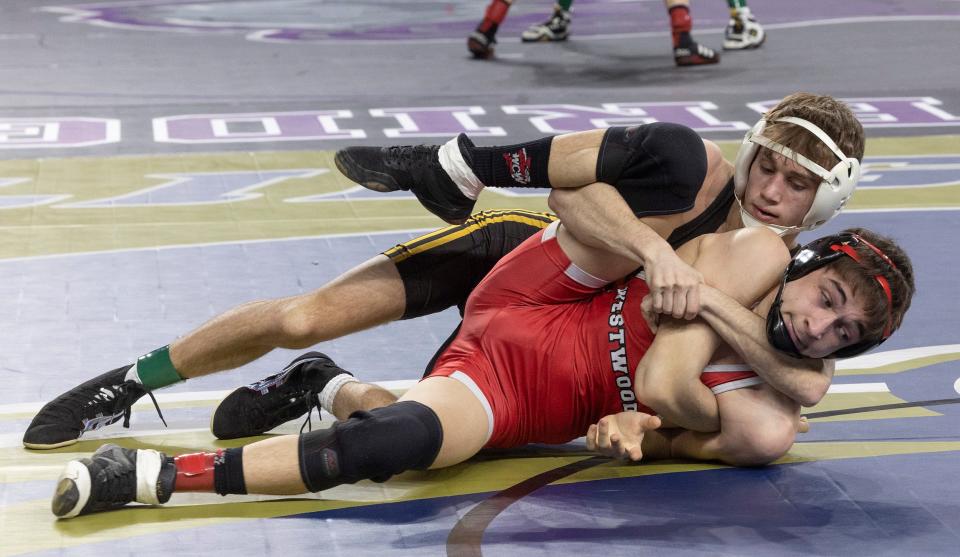 North Hunterdon Logan Wadle pulls Westwood Anthony Lavezzola back with a cradle during their 106 lbs. bout on Day One at NSIAA Wrestling Championships in Atlantic City on March 2, 2023. 