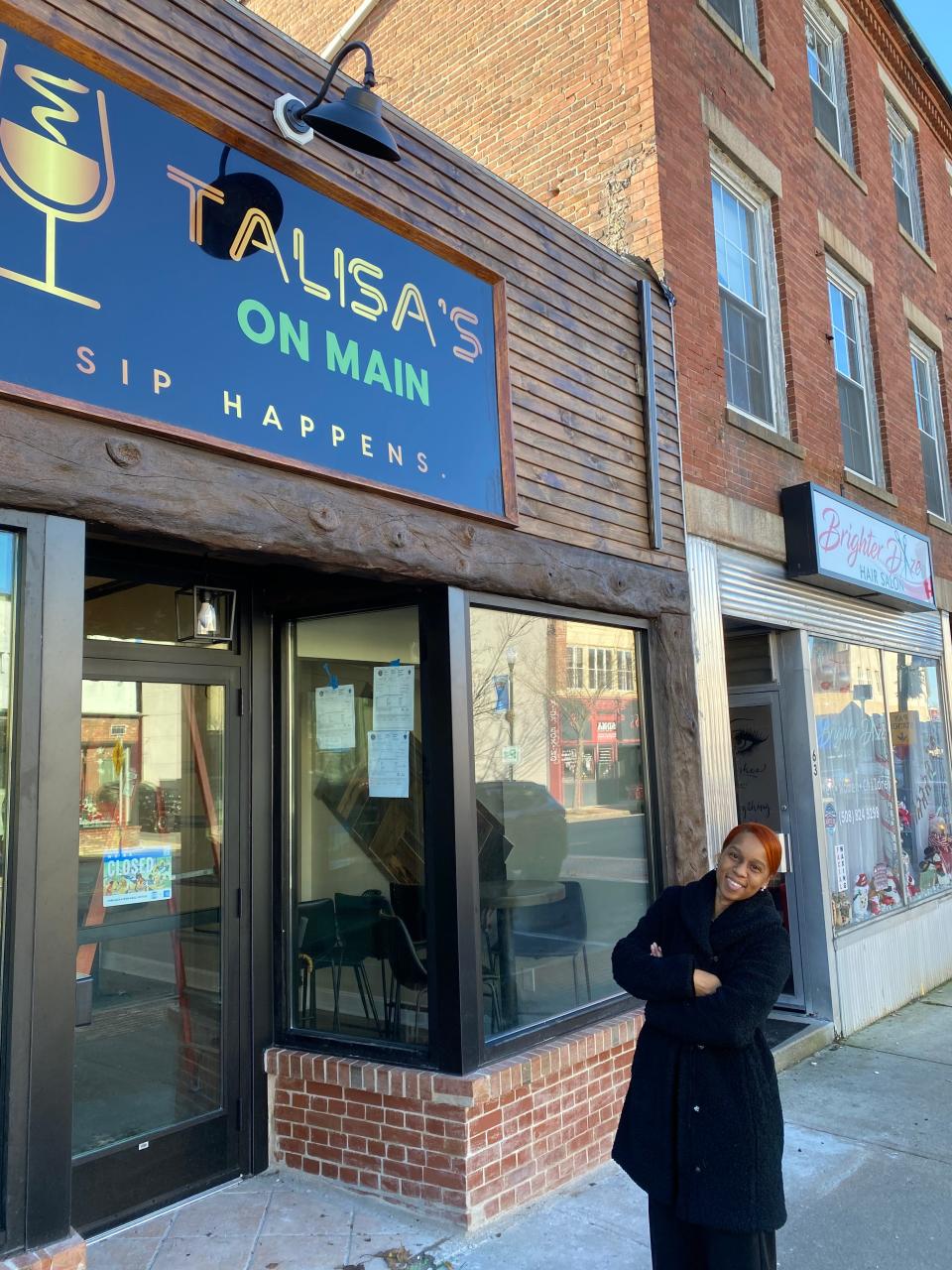 Owner Talisa Proctor stands in front of her soon-to-open wine bar, Talisa's on Main, at 65 Main St. in Taunton, on Wednesday, Dec. 20, 2023.