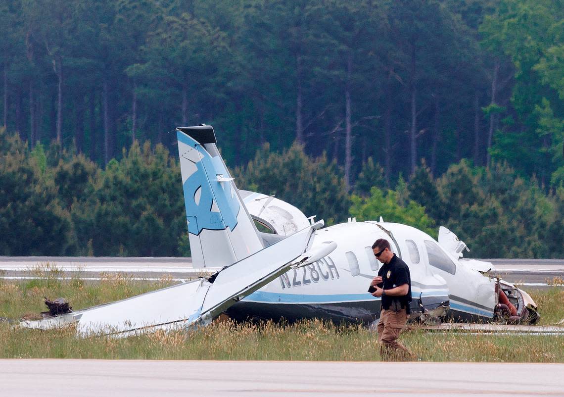 A small plane crashed near a runway at Raleigh-Durham International Airport on Wednesday morning, resulting in a halt of all flights in and out. The single-engine plane belongs to Medical Air Inc. and was used by UNC Air Operations. The plane arrived at RDU from Wilmington International Airport shortly after 10 a.m., according to FlightAware.com, and was carrying two people — the pilot and a physician, according to UNC Health.