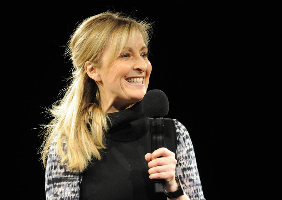 Television presenter Fiona Phillips introduces Labour Party leader Ed Miliband during a shadow cabinet public consultation event at the Capital FM Arena in Nottingham.   (Photo by Geoff Kirby/PA Images via Getty Images)