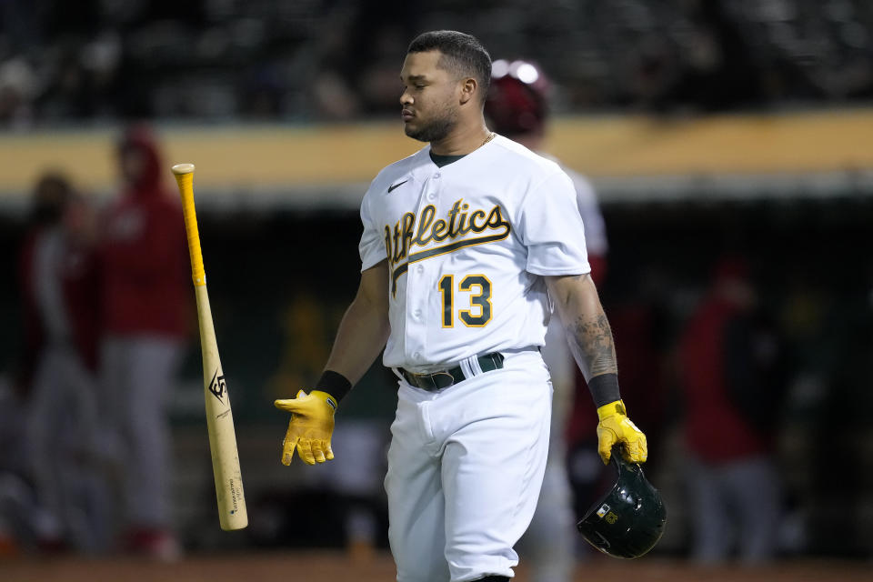 Oakland Athletics' Jordan Diaz (13) reacts after striking out against the Cincinnati Reds during the seventh inning of a baseball game in Oakland, Calif., Friday, April 28, 2023. (AP Photo/Jeff Chiu)