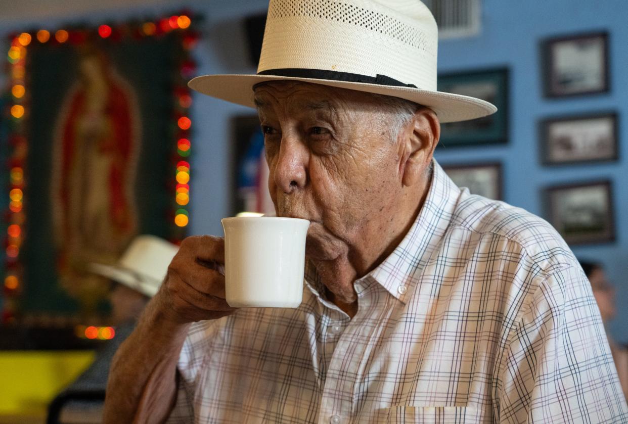 Conjunto music legend and life-long Austinite Johnny Degollado, known as "El Montopolis Kid," sips his coffee at Joe's Bakery in Austin, April 30, 2024. Degollado spent many years in Austin organizing and performing his music at festivals and celebrations, including Cinco De Mayo celebrations.
