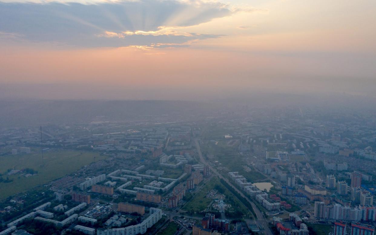 Smoke from forest fires shrouds the Siberian city of Krasnoyarsk - TASS