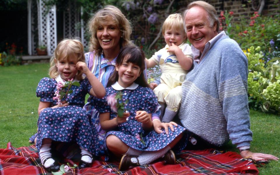 Dame Esther with her family, including daughter Rebecca Wilcox (left), in 1986