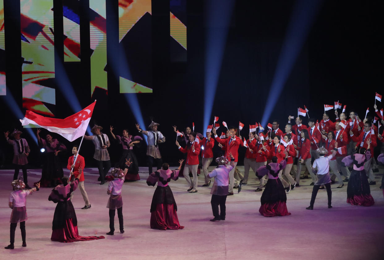 The Singapore contingent entering the Philippine Arena in Bocaue during the SEA Games Opening Ceremony on 30 November. (PHOTO: Reuters/Eloisa Lopez)