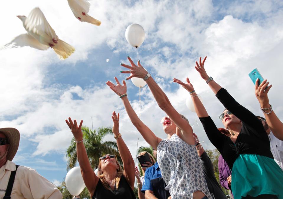 <p>Friends and family release doves and balloons during the funeral for Franky Jimmy De Jesus Velazquez, one of the victims of the shooting at the Pulse night club in Orlando, in his hometown of Caguas, Puerto Rico, June 21, 2016. (REUTERS/Alvin Baez) </p>