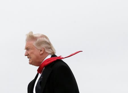 U.S. President Donald Trump and Vice-President elect Mike Pence walk off Trump's plane upon their arrival in Indianapolis, Indiana, U.S., December 1, 2016. REUTERS/Mike Segar/Files