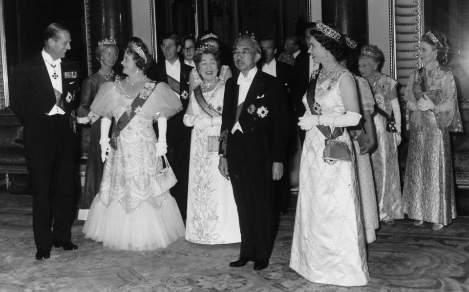 (from left) Prince Philip, The Duchess of Kent, Queen Elizabeth the Queen Mother, Prince Charles, Empress Nagako, Emperor Hirohito, Lord Snowdon and Queen Elizabeth II