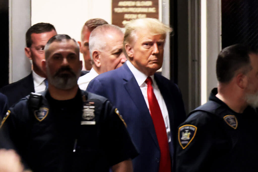 Former U.S. President Donald Trump arrives for his arraignment at Manhattan Criminal Court on April 4, 2023, in New York City. With the indictment, Trump became the first former U.S. president in history to be charged with a criminal offense.