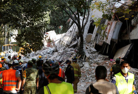 A collapsed building is seen after an earthquake in Mexico City, Mexico September 19, 2017. REUTERS/Henry Romero