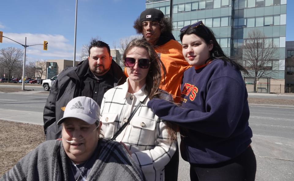 From left to right: Carrie Boudreau, her only surviving child Christopher Halliday, Shallen Dearing, Sommer Boudreau's son Tyee Boudreau, and her daughter Tia Boudreau, stand outside the Royal Ottawa Mental Health Centre after Adam Rossi's first Ontario Review Board hearing on Thursday.