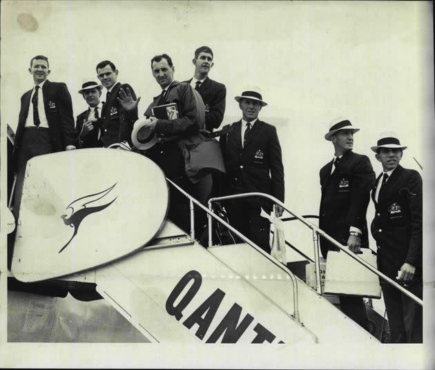 The Australian Basketball Olympic team at Mascot today board their Qantas plane for Hong Kong. September 11, 1964.