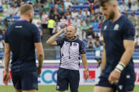Scotland's coach Gregor Townsend gestures ahead of the Rugby World Cup Pool A game at International Stadium between Ireland and Scotland in Yokohama, Japan, Sunday, Sept. 22, 2019. (AP Photo/Eugene Hoshiko)