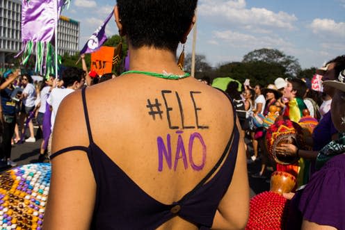 <span class="caption">Women protest Bolsonaro in Brasília, Brazil.</span> <span class="attribution"><a class="link " href="https://www.shutterstock.com/image-photo/brasilia-distrito-federalbrazil-september-29-group-1199637451?src=0nkkgquogl7RJJz-gEFbVQ-2-5" rel="nofollow noopener" target="_blank" data-ylk="slk:Arthur S Costa/Shutterstock;elm:context_link;itc:0;sec:content-canvas">Arthur S Costa/Shutterstock</a></span>
