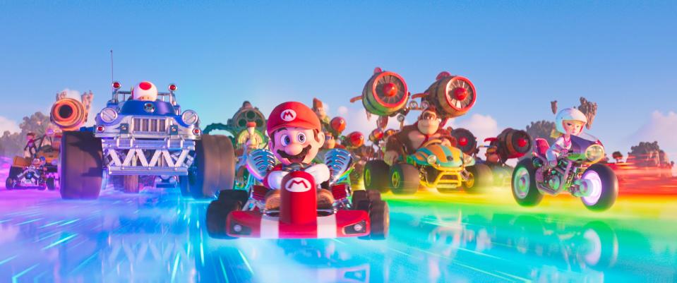 Toad (voiced by Keegan-Michael Key, far left), Mario (Chris Pratt), Donkey Kong (Seth Rogen) and Princess Peach (Anya Taylor-Joy) rev their engines on Rainbow Road in "The Super Mario Bros. Movie."