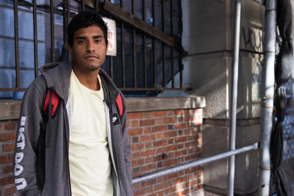 Cleiver Rodriguez, 24, poses for a portrait, Thursday, Sept. 15, 2022, in New York. Rodriguez, an immigrant from Venezuela, arrived to Manhattan in a bus sent by Texas governor Greg Abbott and is thankful for a free ride to New York. (AP Photo/Julia Nikhinson)