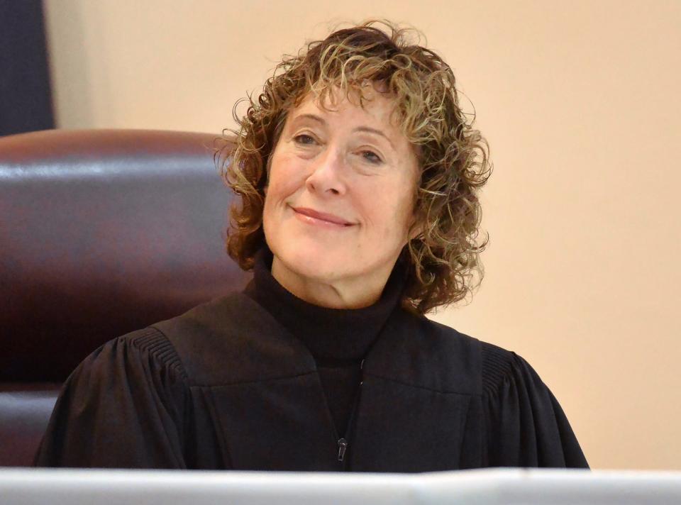 Erie County Judge Elizabeth K. Kelly, who is retiring in April, attends the swearing-in ceremony of judicial and county elected officials inside courtroom H at the Erie County Courthouse in Erie on Tuesday.