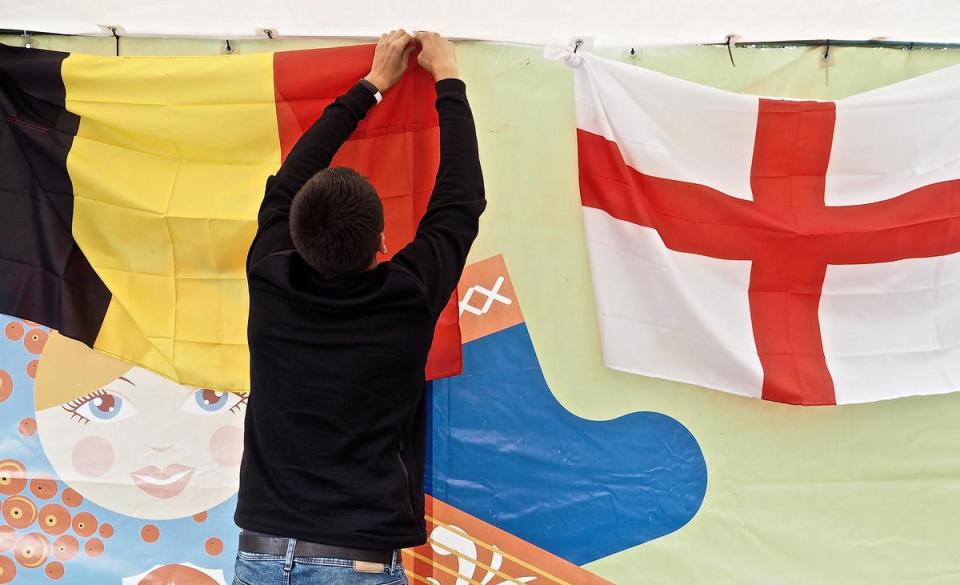 Exploring Kaliningrad: Kaliningrad gets ready to host Belgium and England, their flags not quite eclipsing the Russian doll (Richard Morgan)