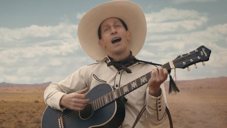 Tim Blake Nelson as Buster Scruggs