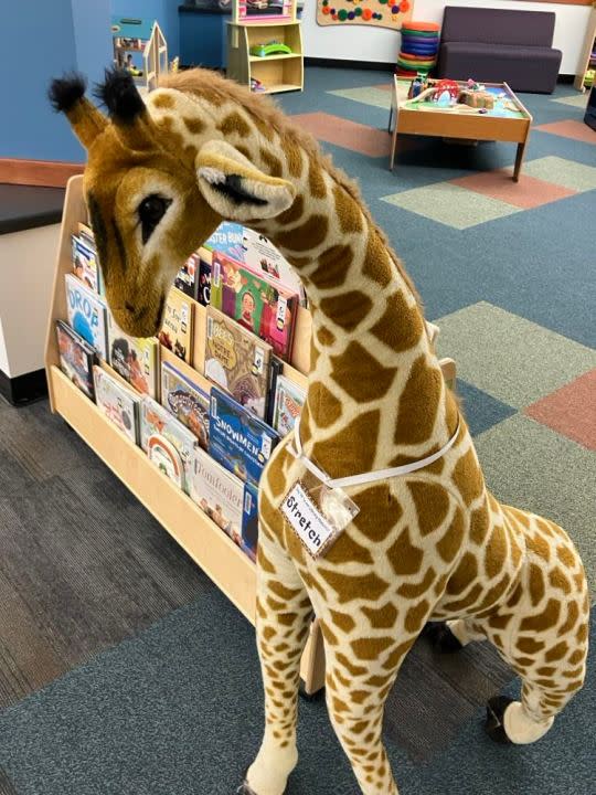 The library mascot is the giraffe Stretch (photo by Jonathan Turner).