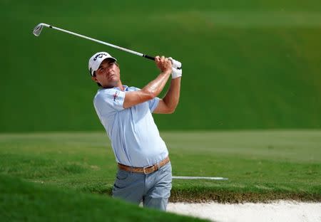 FILE PHOTO - Aug 13, 2017; Charlotte, NC, USA; Kevin Kisner plays from a bunker on the third hole during the final round of the PGA Championship at Quail Hollow Club. Mandatory Credit: Kyle Terada-USA TODAY Sports