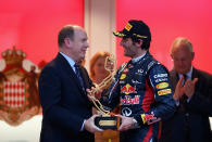 Mark Webber of Australia and Red Bull Racing receives the winners trophy from Prince Albert II of Monaco following the Monaco Formula One Grand Prix at the Circuit de Monaco on May 27, 2012 in Monte Carlo, Monaco. (Clive Mason/Getty Images)