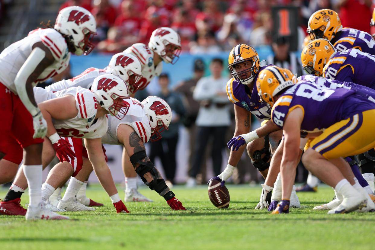 LSU offensive lineman Charles Turner III (69) lines up against the Wisconsin Badgers in the fourth quarter during the ReliaQuest Bowl, Jan. 1, 2024, in Tampa.