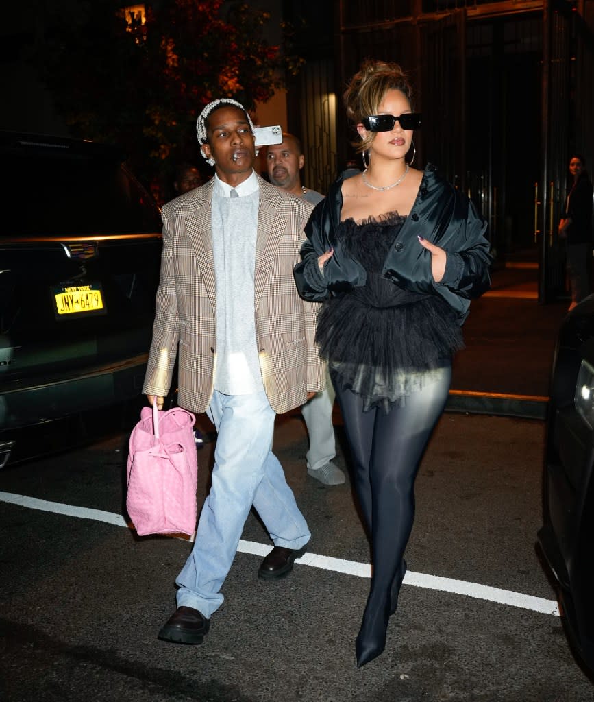 Rapper A$AP Rocky, pictured with Rihanna, has been photographed toting large, leather bags. GC Images