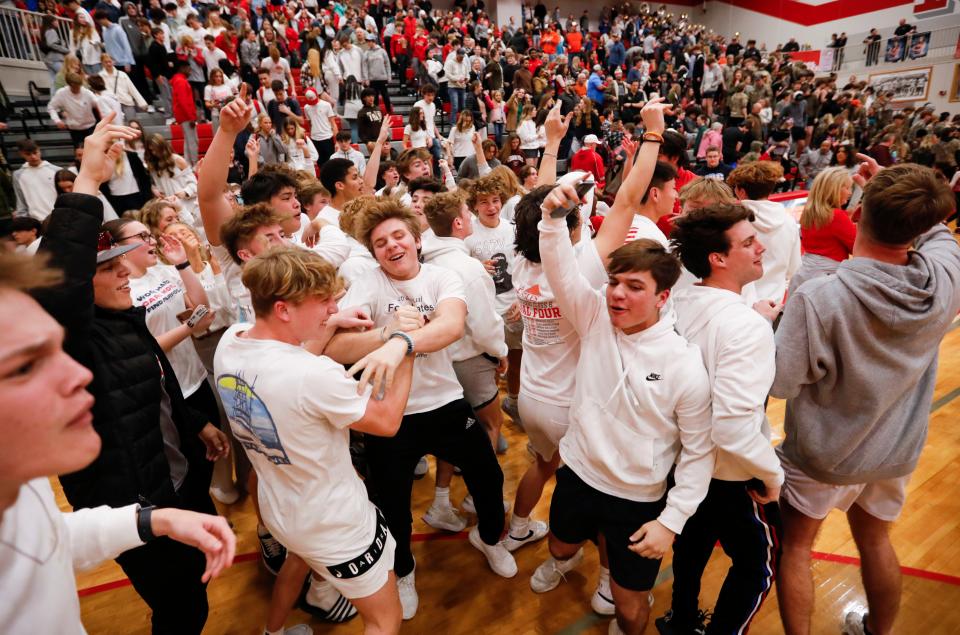Nixa High School students celebrate after the Eagles narrowly beat the Republic Tigers during a game on Tuesday, Feb. 7, 2023. 