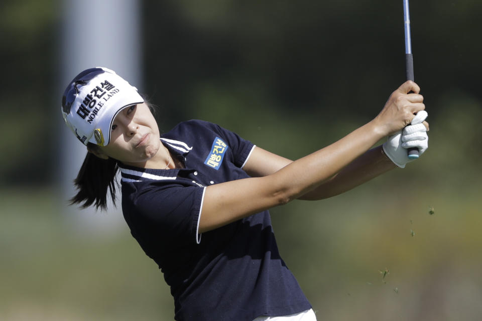 Mi Jung Hur, of South Korea, hits from the sixth fairway during the first round of the Indy Women in Tech Championship golf tournament, Thursday, Sept. 26, 2019, in Indianapolis. (AP Photo/Darron Cummings)