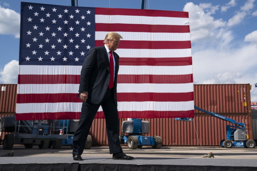 President Donald Trump arrives to speak at Fincantieri Marinette Marine, Thursday, June 25, 2020, in Marinette, Wis. (AP Photo/Evan Vucci)