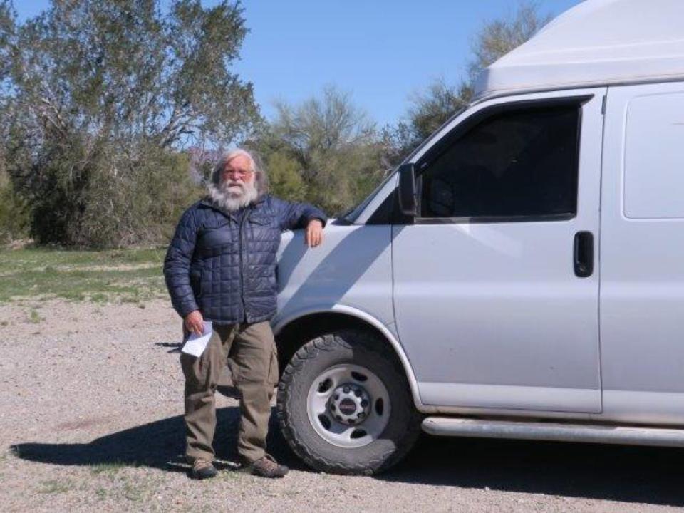 Bob Wells outside van