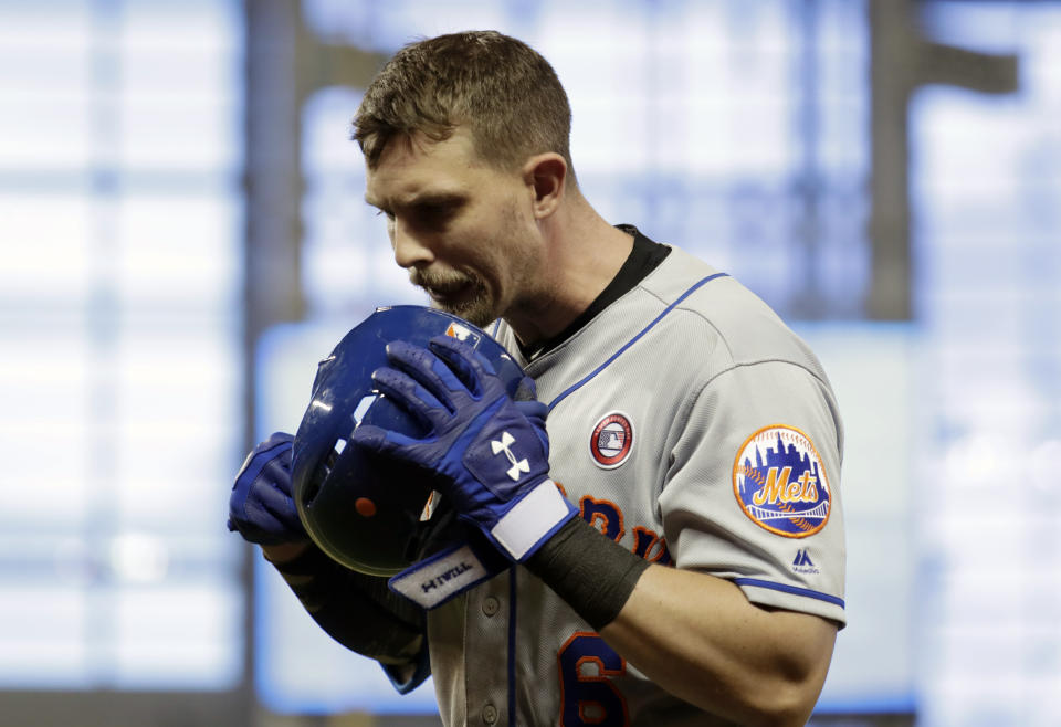 New York Mets' Jeff McNeil reacts after flying out in the ninth inning during a baseball game against the Miami Marlins, Saturday, May 18, 2019, in Miami. (AP Photo/Lynne Sladky)