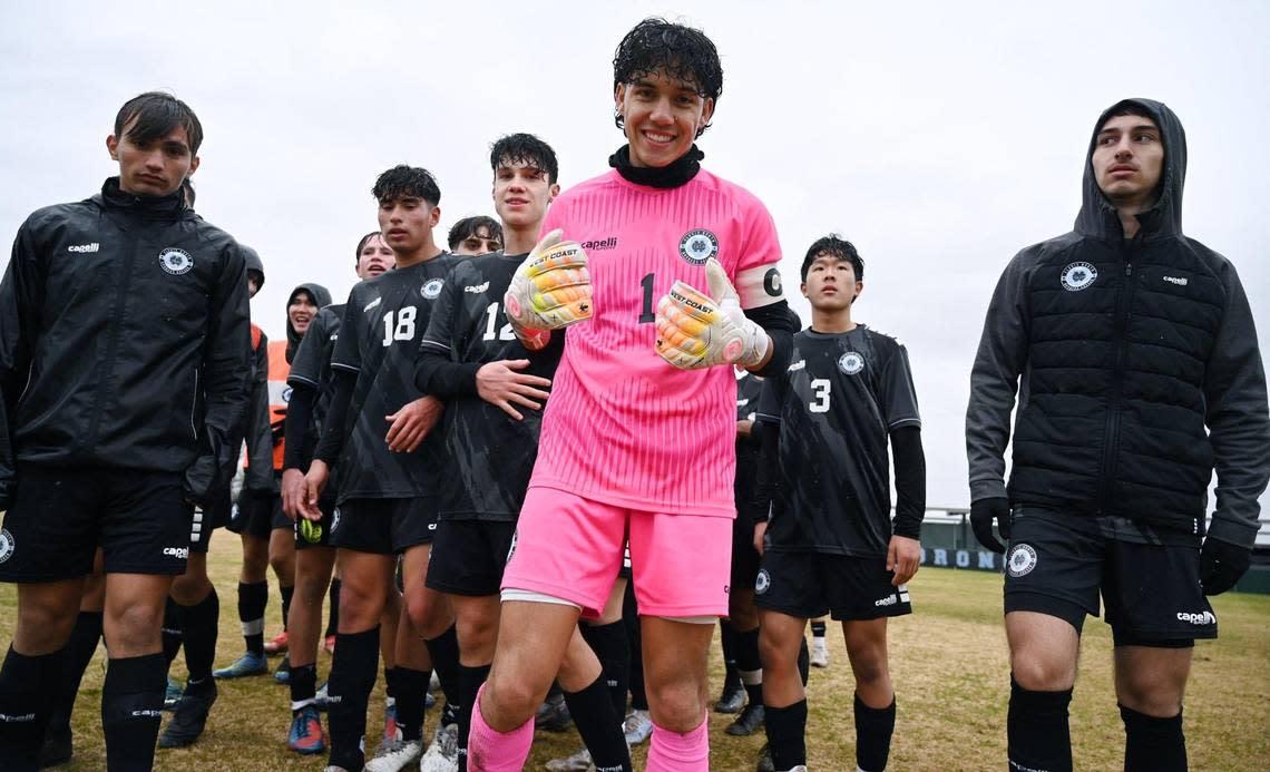 Clovis North goalkeeper Lucas Tabangcura, center, celebrates Clovis North’s 2-0 shutout of Vintage-Napa in the CIF Northern California Regional boys playoff game Tuesday, Feb. 2, 2023 in Clovis.