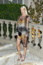 <p>Delevingne stunned in this netted metalic look. (Photo by Donato Sardella/Getty Images for BALMAIN) </p>