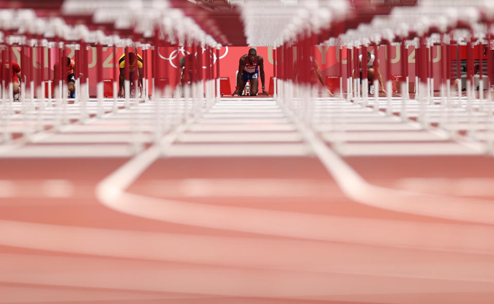 <p>Grant Holloway of Team United States competes in the Men's 110m Hurdles Semi-Final on day twelve of the Tokyo 2020 Olympic Games at Olympic Stadium on August 04, 2021 in Tokyo, Japan. (Photo by Cameron Spencer/Getty Images)</p> 