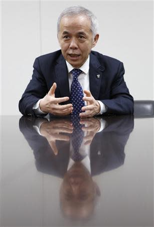 Tokyo Electric Power Co's (TEPCO) President Naomi Hirose speaks during an interview with Reuters at the company's headquarters in Tokyo January 18, 2014. REUTERS/Toru Hanai