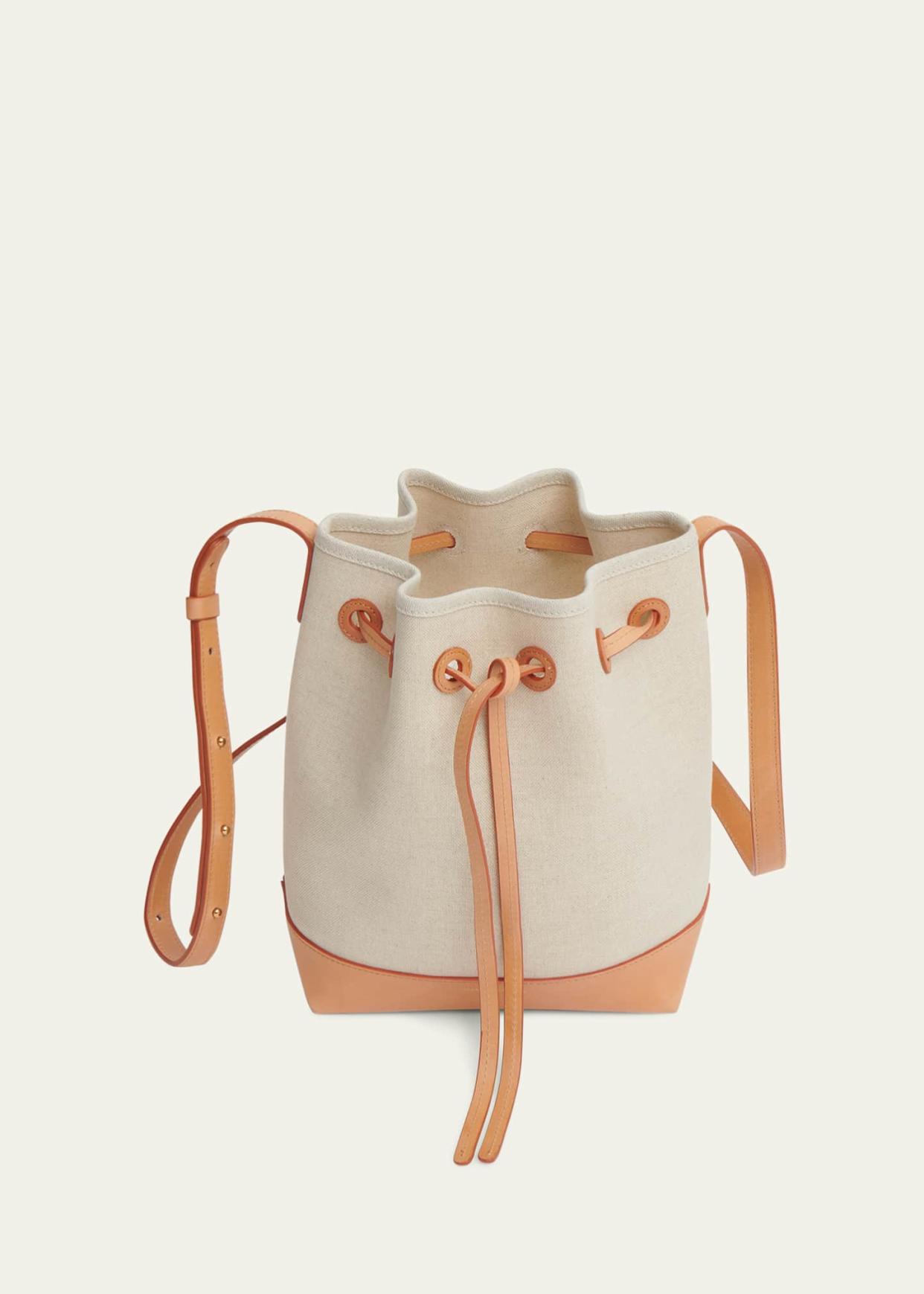 <p><a href="https://go.redirectingat.com?id=74968X1596630&url=https%3A%2F%2Fwww.bergdorfgoodman.com%2Fp%2Fmansur-gavriel-mini-drawstring-canvas-bucket-bag-prod184500006&sref=https%3A%2F%2Fwww.harpersbazaar.com%2Ffashion%2Ftrends%2Fg60114148%2Fbest-designer-bucket-bags%2F" rel="nofollow noopener" target="_blank" data-ylk="slk:Shop Now;elm:context_link;itc:0;sec:content-canvas" class="link rapid-noclick-resp">Shop Now</a></p><p>Mini Drawstring Canvas Bucket Bag</p><p>bergdorfgoodman.com</p><p>$495.00</p><span class="copyright">bergdorfgoodman.com</span>