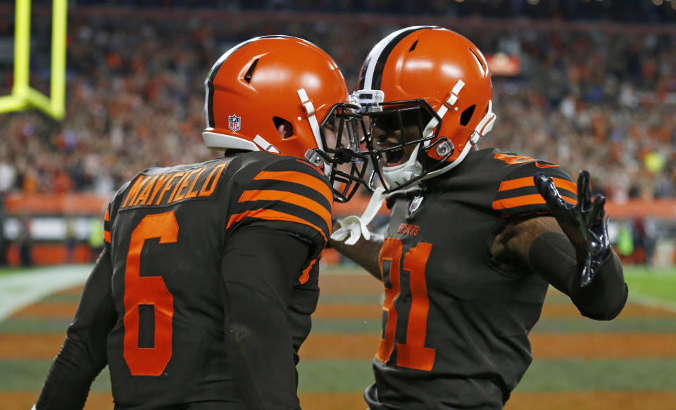 Cleveland Browns quarterback Baker Mayfield (6) and wide receiver Rashard Higgins (81) celebrate a 2-point conversion during the second half of an NFL football game against the New York Jets, Thursday, Sept. 20, 2018, in Cleveland. (AP Photo/Ron Schwane)