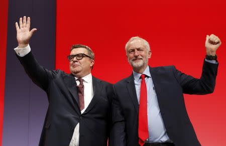 Jeremy Corbyn (R), Britain's opposition Labour Party leader, joins deputy leader Tom Watson on stage after his speech during the third day of the Labour Party conference in Liverpool, September 27, 2016. REUTERS/Darren Staples