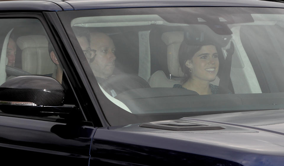 Jack Brooksbank and Princess Eugenie arrive at Windsor Castle (REUTERS)