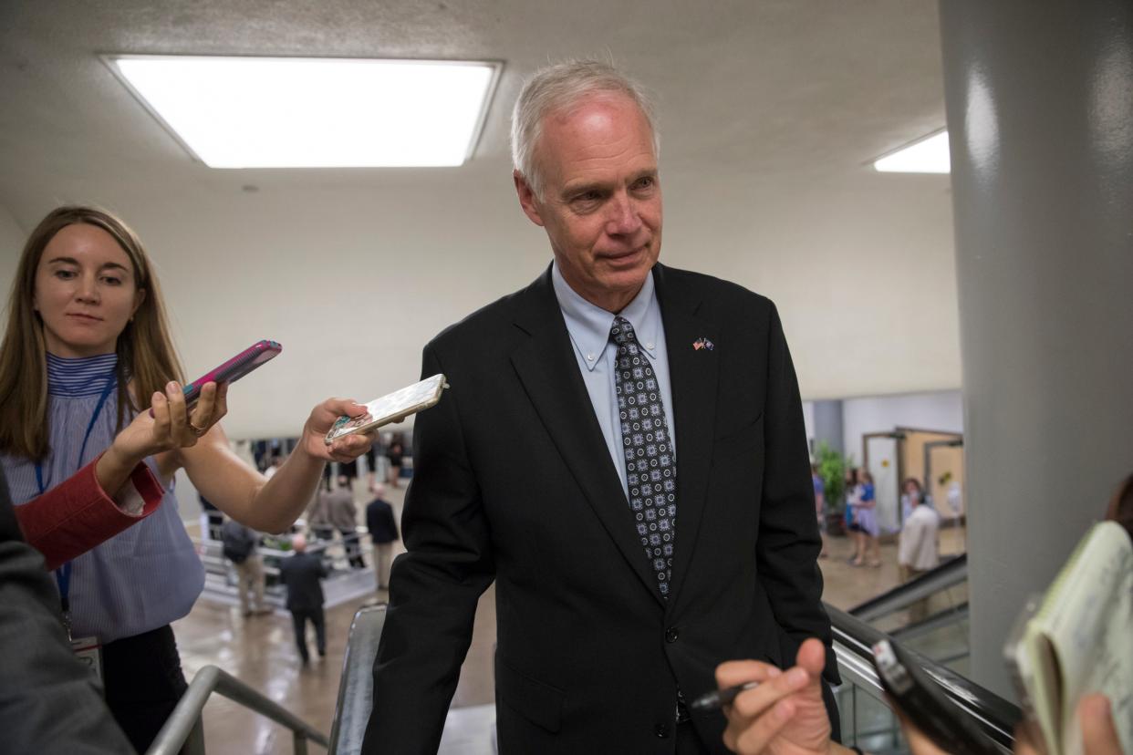 Sen. Ron Johnson, R-Wis., an opponent of the GOP health care bill, heads to the chamber for a vote, on Capitol Hill.