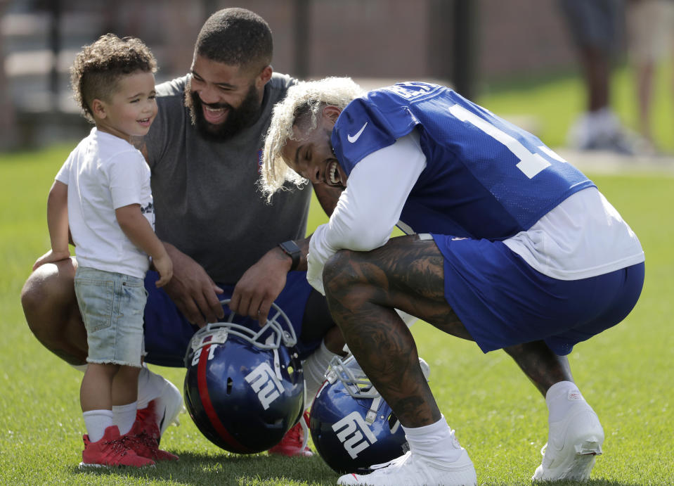 Odell Beckham, all smiles . (AP Photo/Julio Cortez)