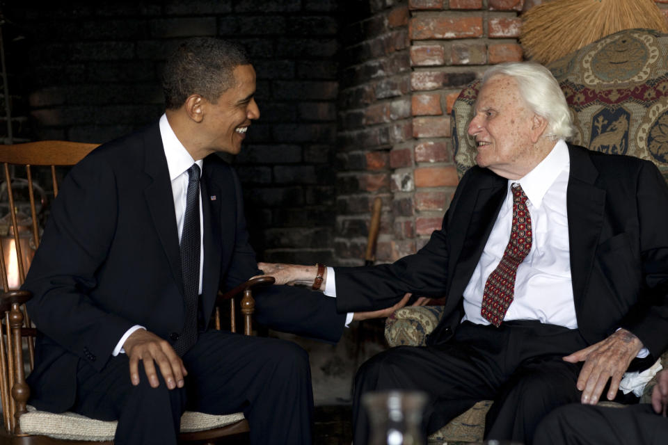 In this image released by the White House, President Barack Obama meets with Billy Graham, 91, at his mountainside home in Montreat, N.C., Sunday, April 25, 2010. Obama concluded his North Carolina vacation with his first meeting of the ailing evangelist, who has counseled commanders in chief since Dwight Eisenhower. (AP Photo/The White House, Pete Souza)