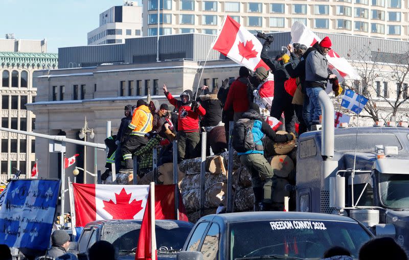 FILE PHOTO: Truckers take part in a convoy and protest against COVID-19 vaccine mandate in Ottawa