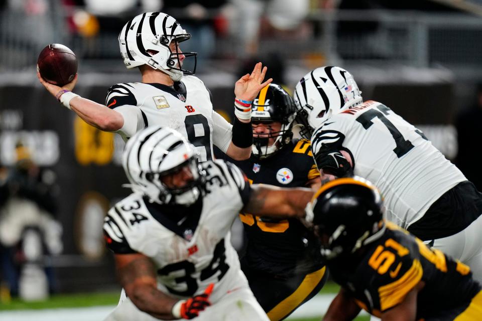 Cincinnati Bengals quarterback Joe Burrow throws while under pressure against the Steelers. This week against the Chiefs, the Bengals are counting on Burrow matching Chiefs quarterback Patrick Mahomes.