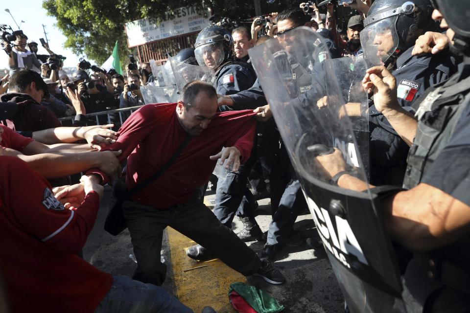 Protesters in Tijuana chant ‘Out!’ at Central American migrants